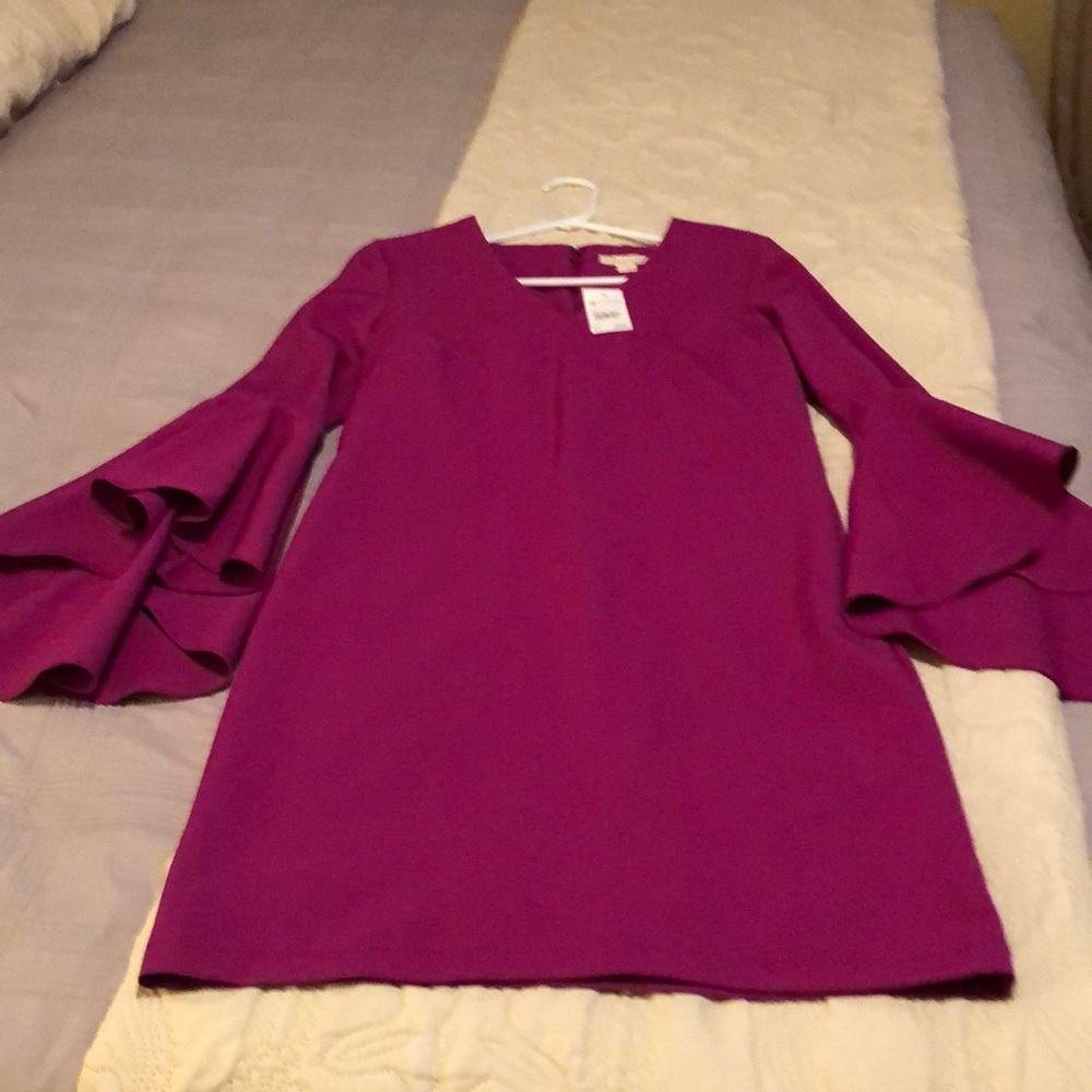 Dress with flutter sleeves. Fushia
